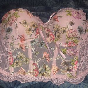 This is a gorgeous floral corset top in a classy pink color
